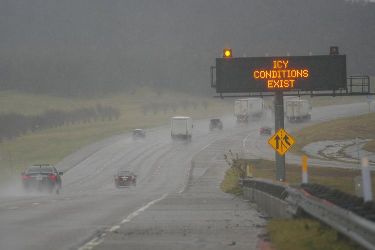 Winter storm plods into the Deep South, prompting states of emergency and school closures