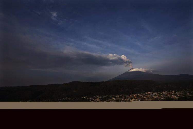 Volcano rumbles near Mexico City, coating towns with ash, disrupting flights