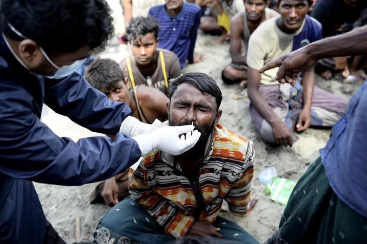 Over 300 Rohingya Muslims fleeing Myanmar arrive in Indonesia's Aceh region after weeks at sea
