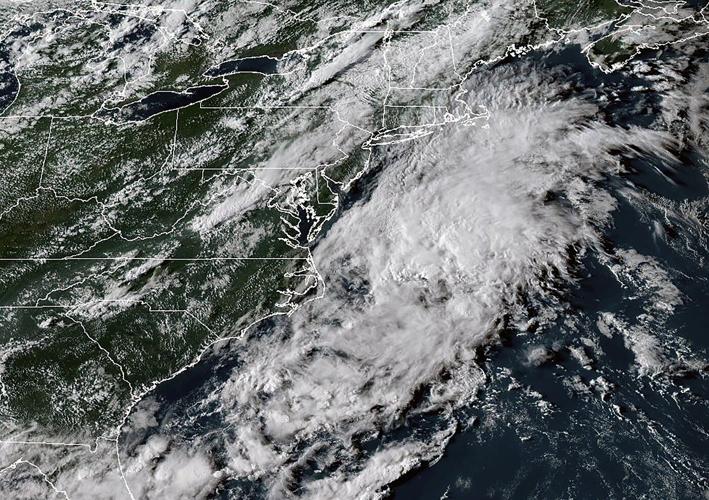 Tropical storms Juliette and Fernand churn over open waters in different oceans