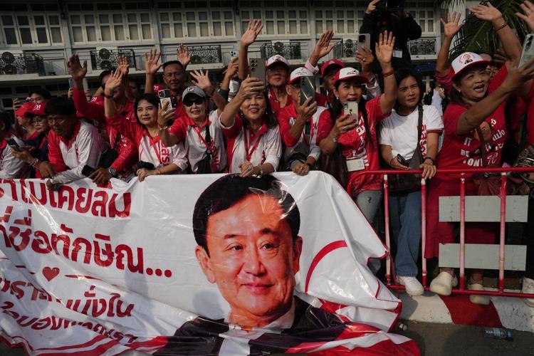 Thailand's Thaksin released from prison after serving 8 months for abuse of power