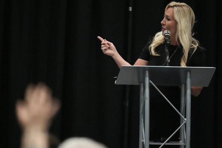 Marjorie Taylor Greene laughs off protests to deliver pro-Trump message at Georgia town hall