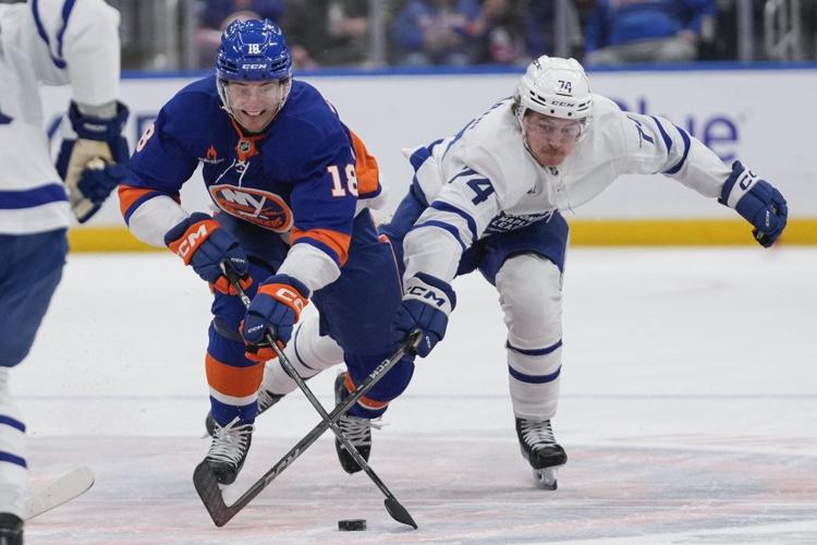 McMann, Woll lead Maple Leafs to 2-1 win over Islanders