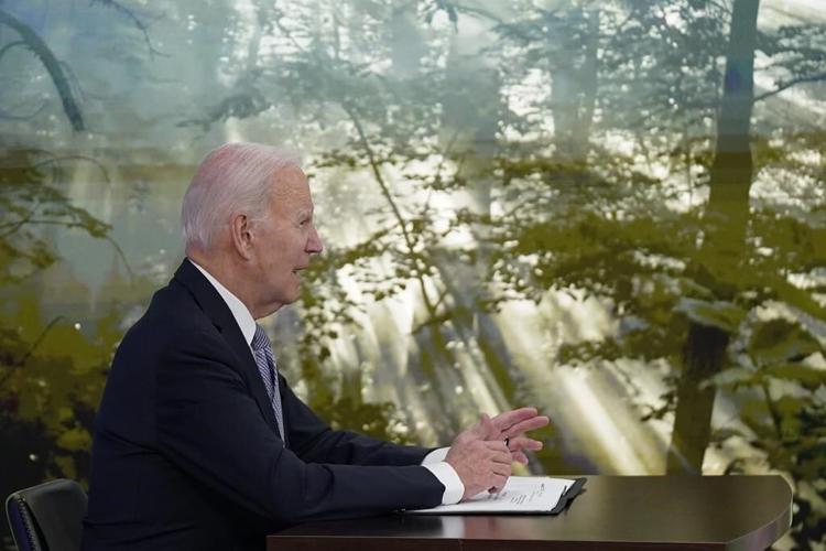 Biden touts US climate efforts as oil overshadows summit