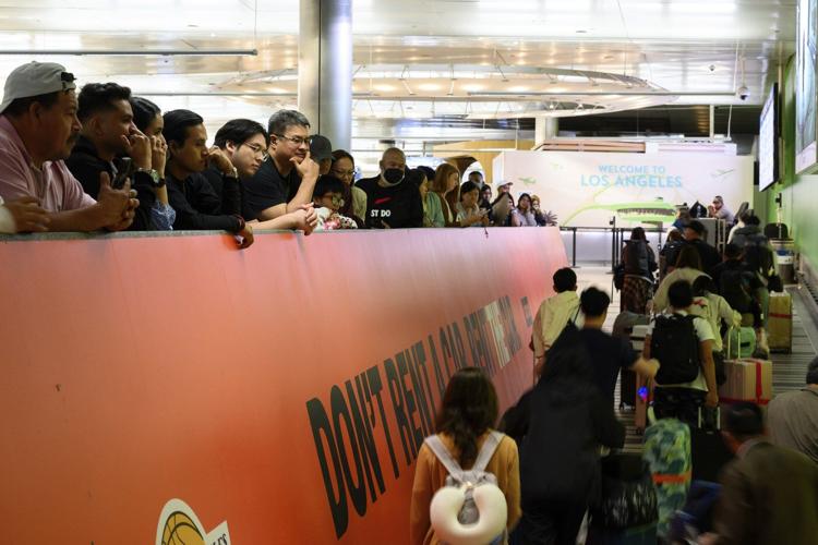 Trump's new travel ban takes effect as tensions escalate over immigration enforcement