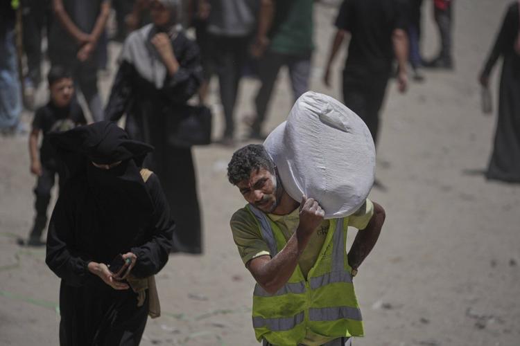 59 Palestinians in Gaza are killed by Israeli airstrikes or shot dead while seeking aid