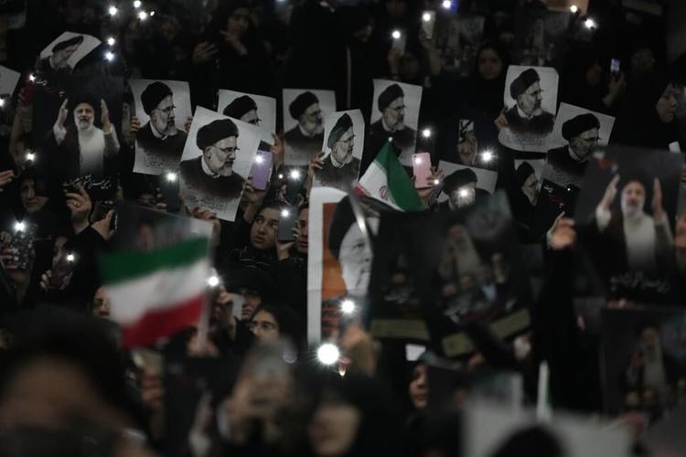 Iran's supreme leader presides over funeral for president and others killed in helicopter crash