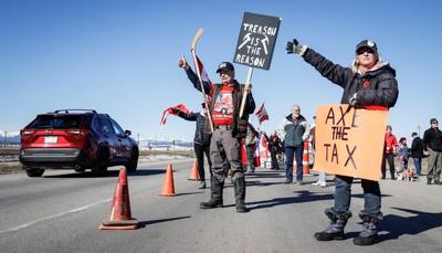 'It just needs to stop': Carbon price protesters slow traffic on Trans-Canada Highway