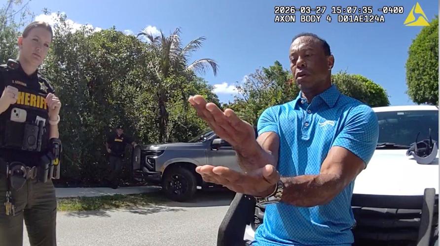 Bodycam shows a stunned Tiger Woods handcuffed after a Florida rollover crash