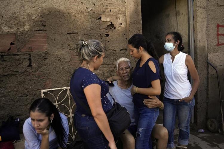 Tales of survival emerge as Venezuela landslide toll hits 34