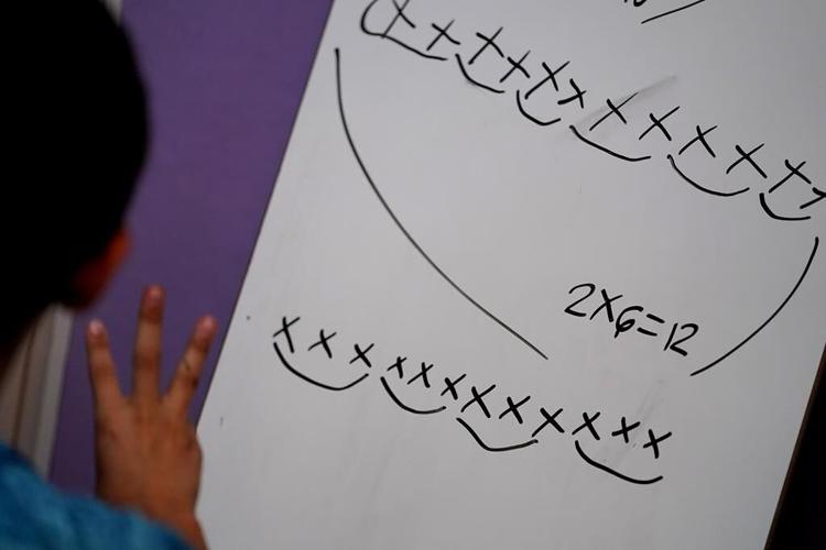 In 1 classroom, 4 teachers manage 135 kids -- and love it