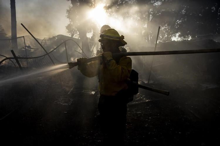 Thousands evacuate as wildfires rage outside Los Angeles and Reno, Nevada