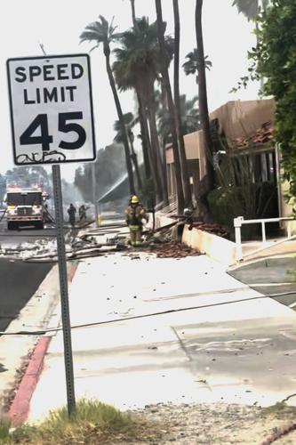 Police and firefighters respond to a car explosion rocking the California city of Palm Springs