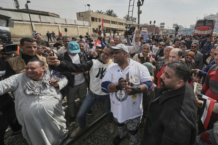 Photos of Egypt’s ‘strongman’ pulling ships, trains and cars in jaw-dropping feats