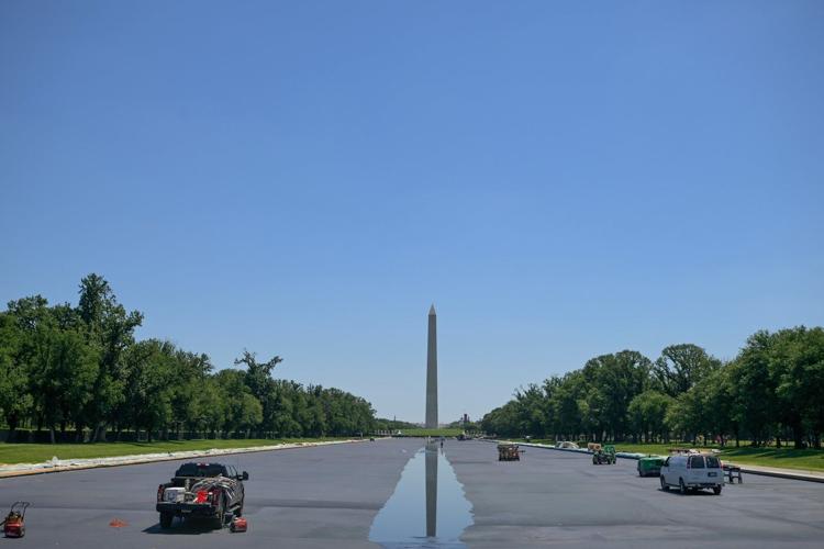 Water begins refilling Reflecting Pool after Trump's renovation to repaint it 'American flag blue'