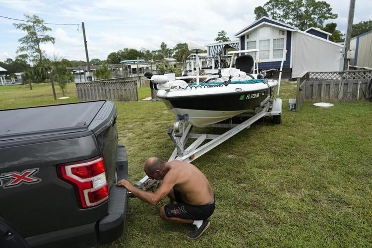 Hurricane Idalia chases Florida residents from the Gulf Coast as forecasters warn of storm surge