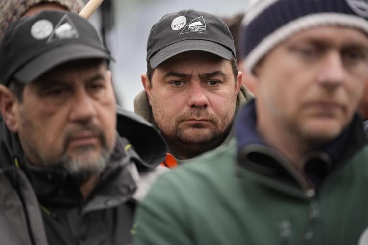 France's 2 key farmers unions suspend protests after the government offered new measures