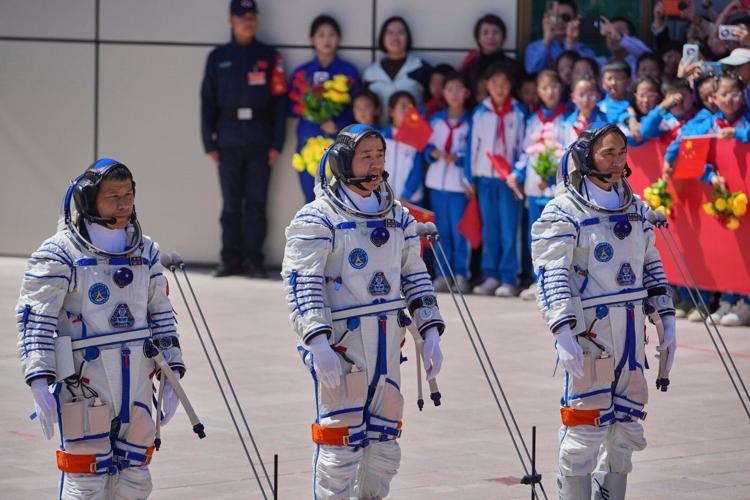 China's stranded astronauts 'in good condition' after space debris delays planned return