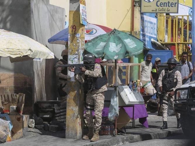 Haiti's main airport and capital frozen a day after a plane was shot by gangs