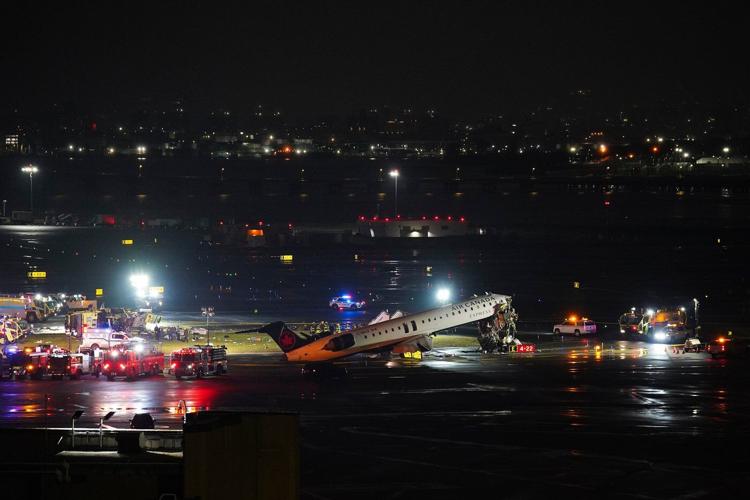 Air Canada flight collides with a Port Authority vehicle at New York's LaGuardia Airport