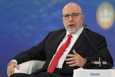 Former 2016 Trump campaign adviser is charged over his work for sanctioned Russian TV