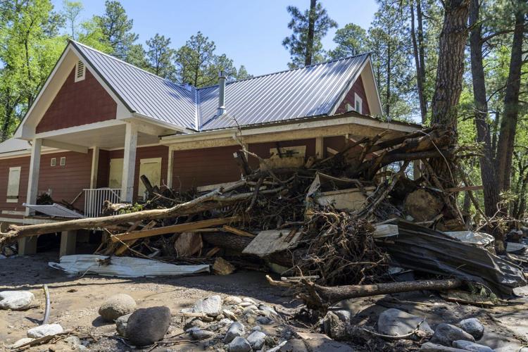 New Mexico mountain village braces for more rain following deadly flash flooding