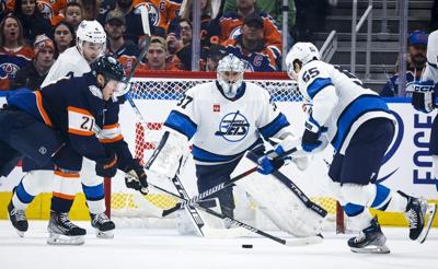Hellebuyck props up Jets in 2-1 win over Oilers