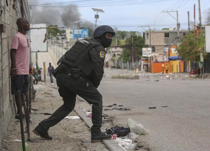 Haiti’s main airport shuts down as gang violence surges and a new prime minister is sworn in