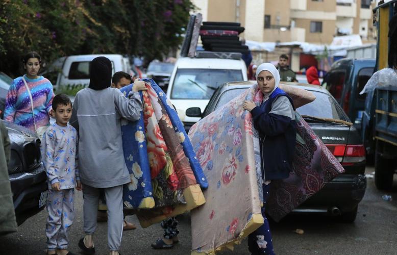 Israel-Hezbollah ceasefire appears to hold and Lebanese begin streaming south to their homes