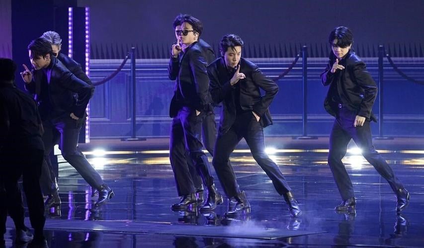 Swift guitar, Eminem shoes among items in charity auction