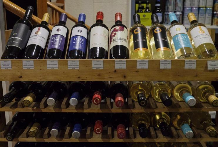 Booze down, elbows up: Prairie politicians, consumers react as tariff war heats up