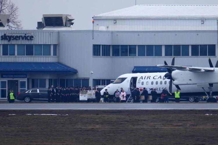 Bodies of pilots who died in collision at N.Y. airport are repatriated to Canada