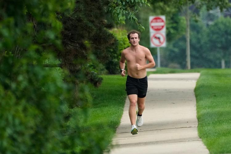 Sweltering Midwest heat cancels outdoor plans as cooling centers open and the East braces