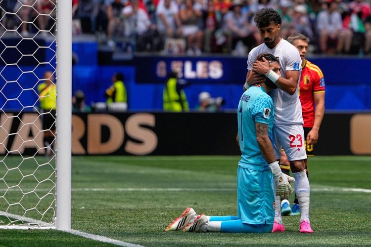 Iran's challenges at World Cup swirl outside draw with Belgium
