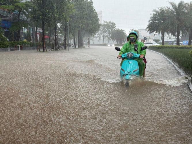 Heavy rain falls in parts of Southeast Asia after tropical storm blows into Vietnam