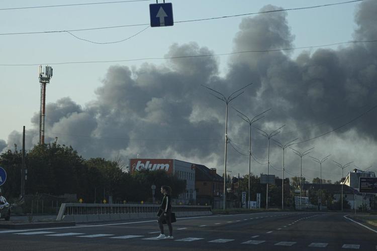 Ukraine government building damaged in Kyiv in the largest Russian attack since the war began