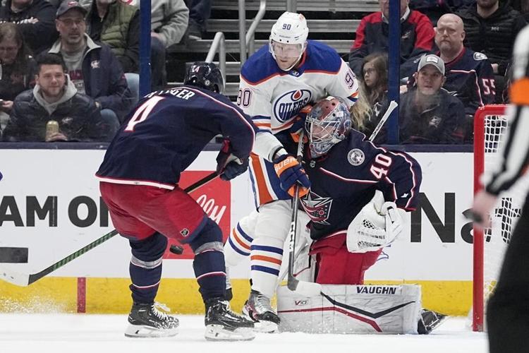Blue Jackets beat Oilers 4-2 as McDavid gets 100th point of season for Edmonton