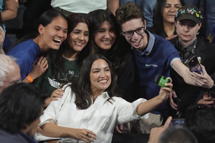 AOC tries to broaden her appeal within a Democratic base spoiling for a fight