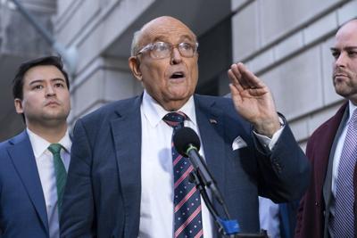 Giuliani settles legal fight with former Georgia election workers and agrees to stop defaming them