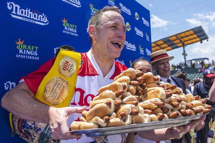 Joey 'Jaws' Chestnut reclaims title in Famous hot dog eating contest, wins 17th Mustard Belt