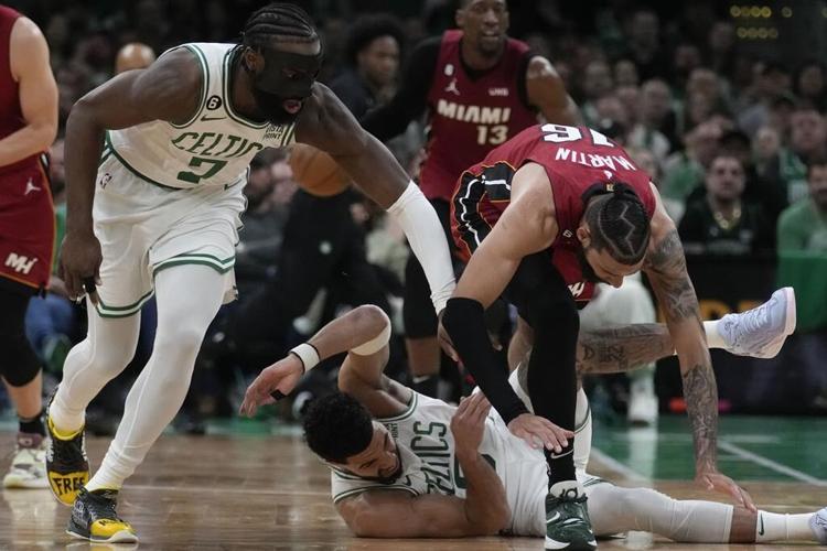 Butler scores 35, Heat rally to beat Celtics 123-116 in East finals opener