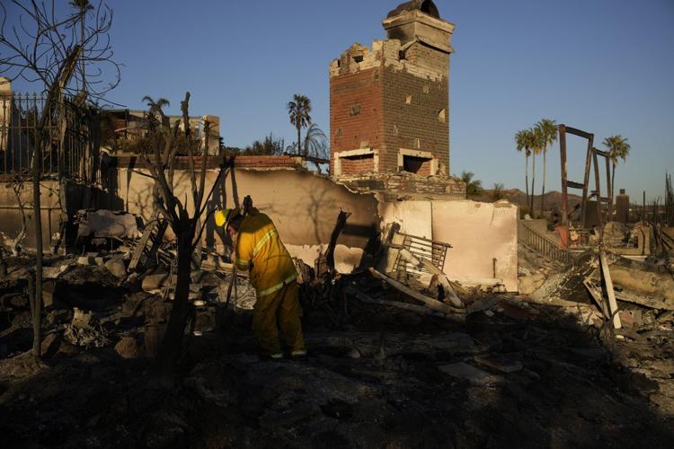 Southern California faces new wildfire warnings as near hurricane-force winds regain strength