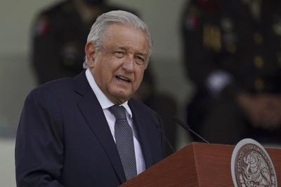 Mexico's president says the army has taken over yet another civilian role: filling potholes