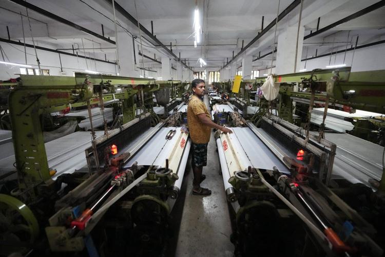 How one Indian textile worker copes with extreme heat in factory work and cramped living quarters