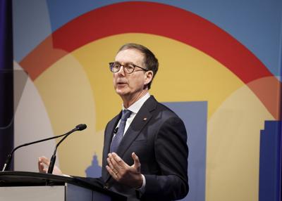 Bank of Canada says it would have likely held rate steady if not for tariffs