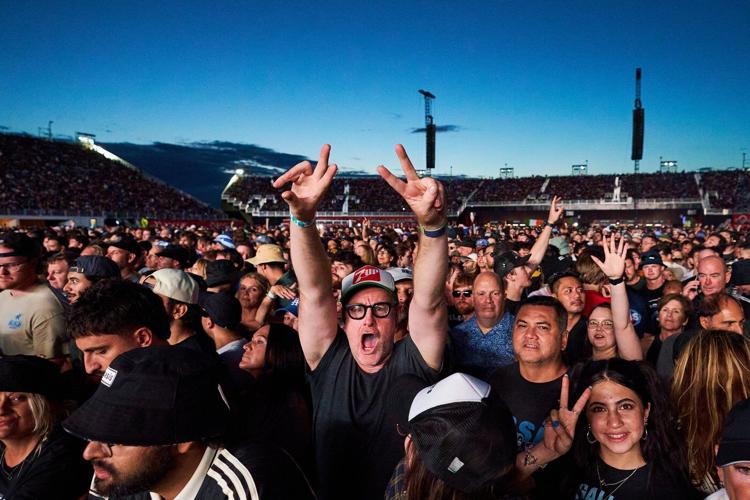 Drenched and nostalgic, Oasis marks Toronto return amid sudden downpour