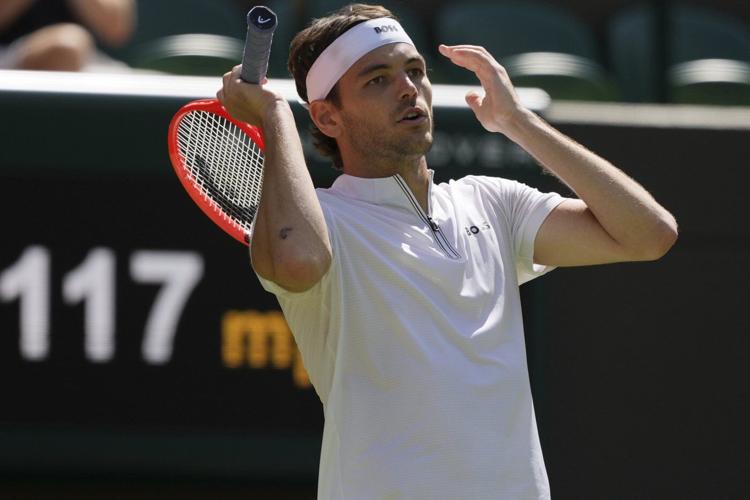 The electronic line-calling system malfunctions during a quarterfinal match at Wimbledon