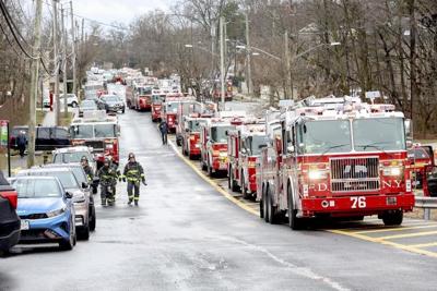 3 NYC firefighters critically hurt in wind-swept house fire