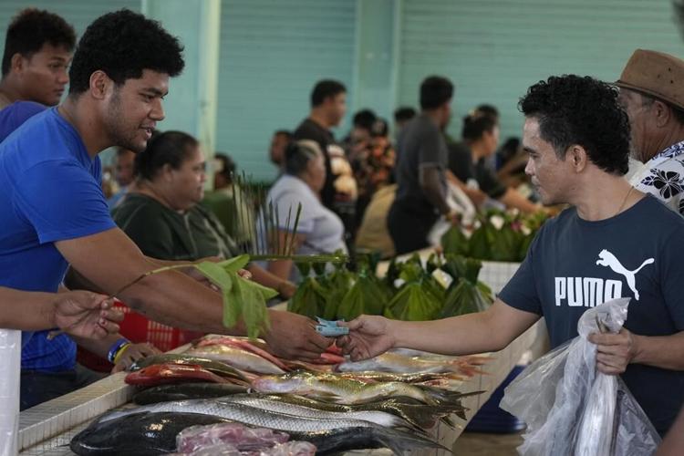 A Samoan village prepares to welcome King Charles but fears an uncertain future for its reef