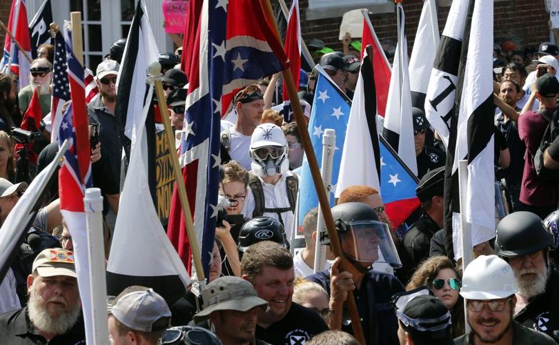 Hate groups in the US decline but their influence grows, report shows